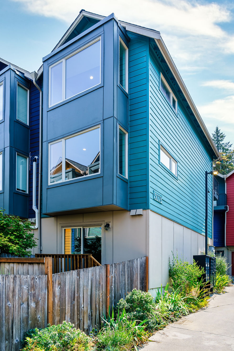 Exterior view of the home's fenced backyard
