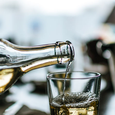 alcohol pouring in a glass