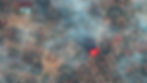 A satellite image shows smoke and fire in Zamzam camp, on 11 April 2025 (Maxar Technologies/Reuters)