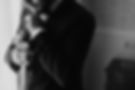 stylish-groom-silhouette-in-suit-posing-
