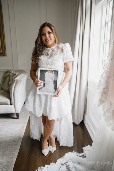 Nanina's In the Park Wedding  - Bride holding photo