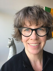 Hilary Peach with horse sculpture in background