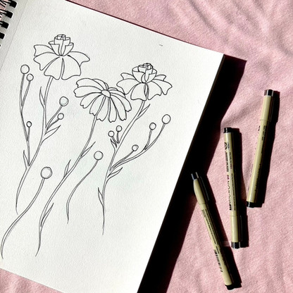 Ariana Lee Creative sketchbook page of a line drawing of flowers