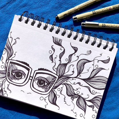Ariana Lee Creative sketchbook page of an abstract line drawing of a face