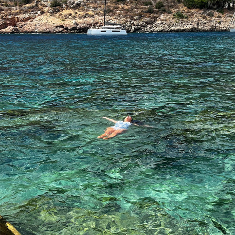 floating in the water in Greece