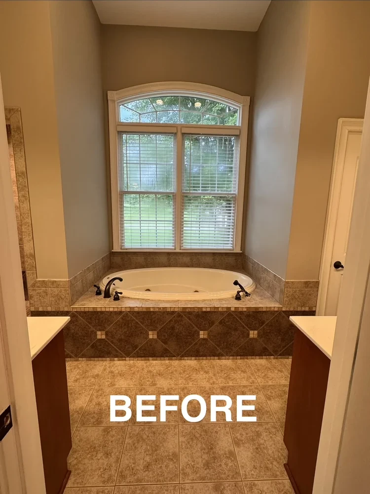 Before: built-in jetted tub set into a tiled deck