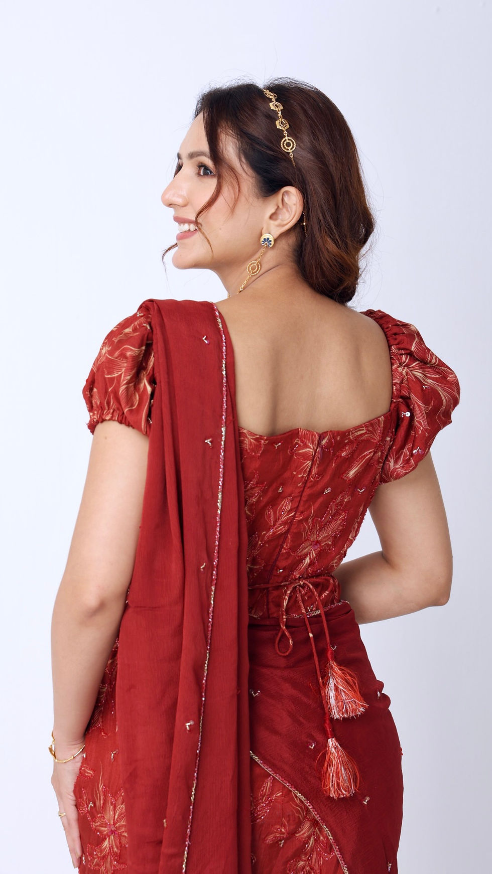Thumbnail: Maroon floral hand-embroidered fish-cut saree gown with puff sleeves and belt