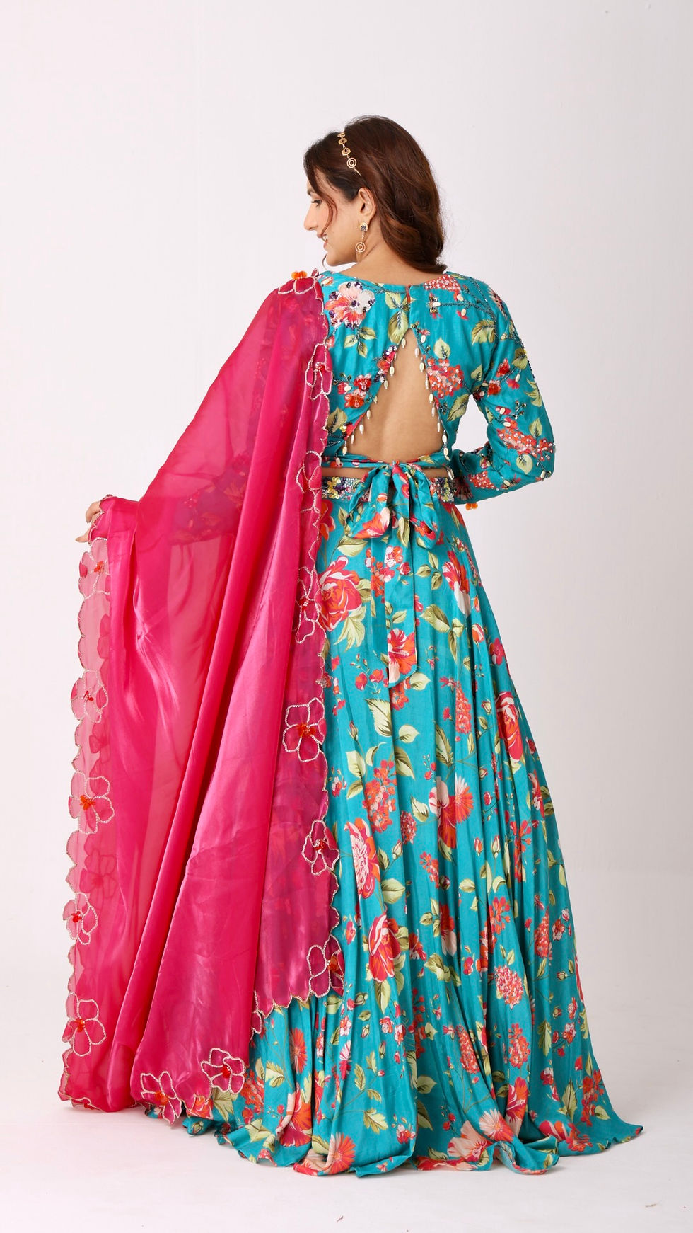 Thumbnail: Floral hand- embroidered turquoise lehenga choli set with a contrasting dupatta