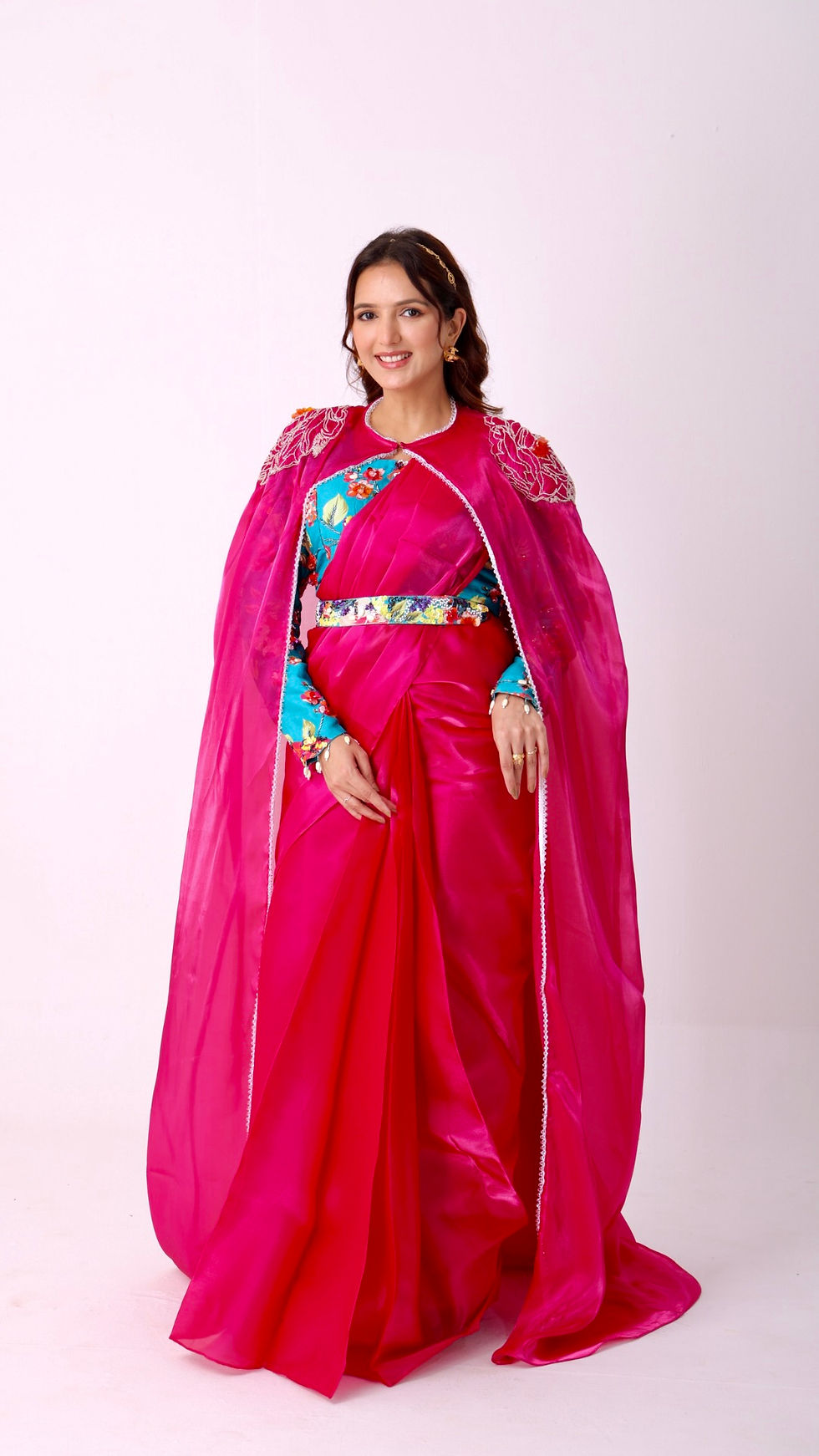 Thumbnail: Fuchsia saree with embroidered cape & floral belt paired with printed blouse