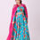Thumbnail: Turquoise vibrant floral lehenga choli set paired with a embroidered cape