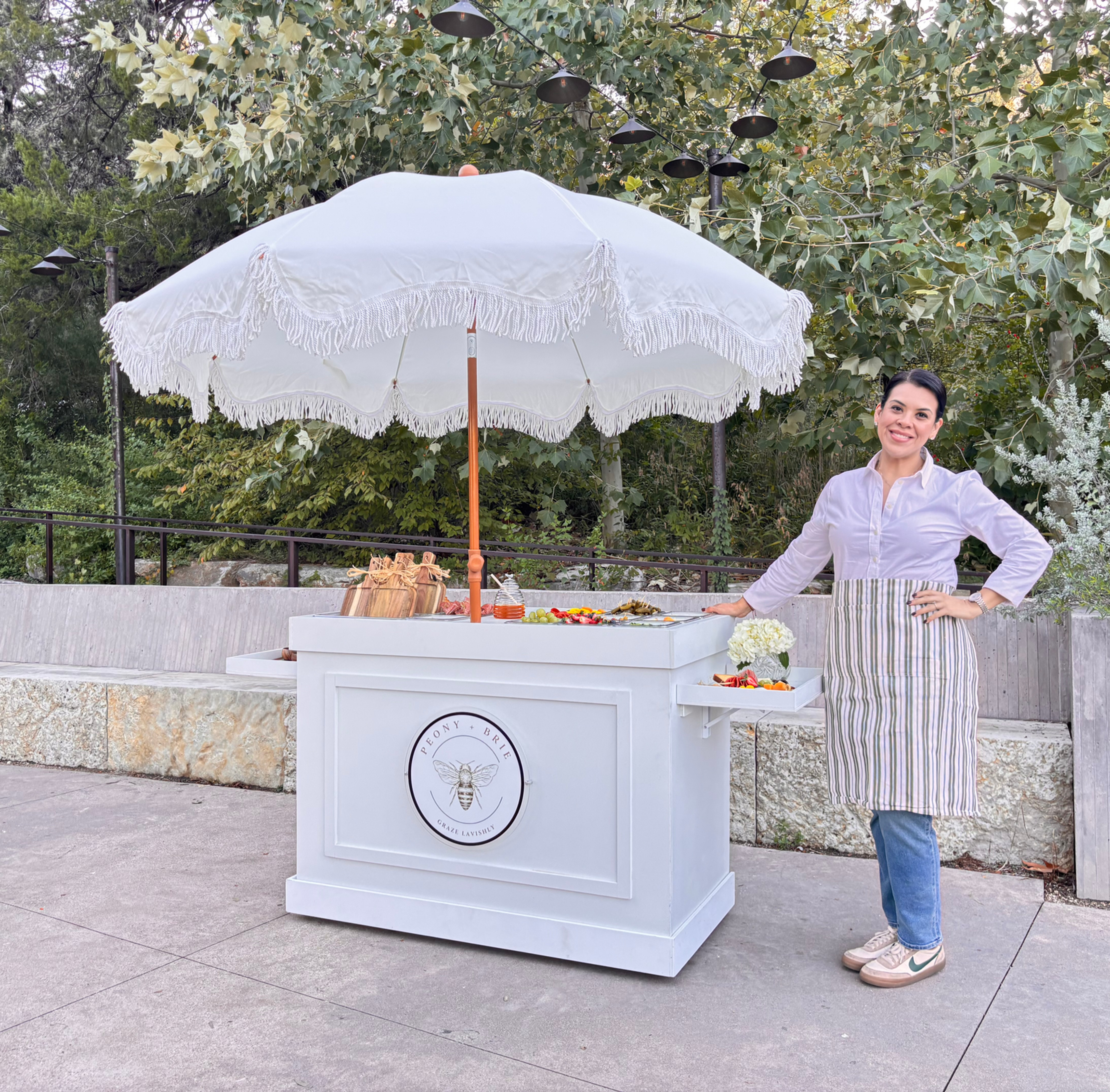 Staphanie Ortiz woman owned small business creating charcuterie boards and food creativity in ATX