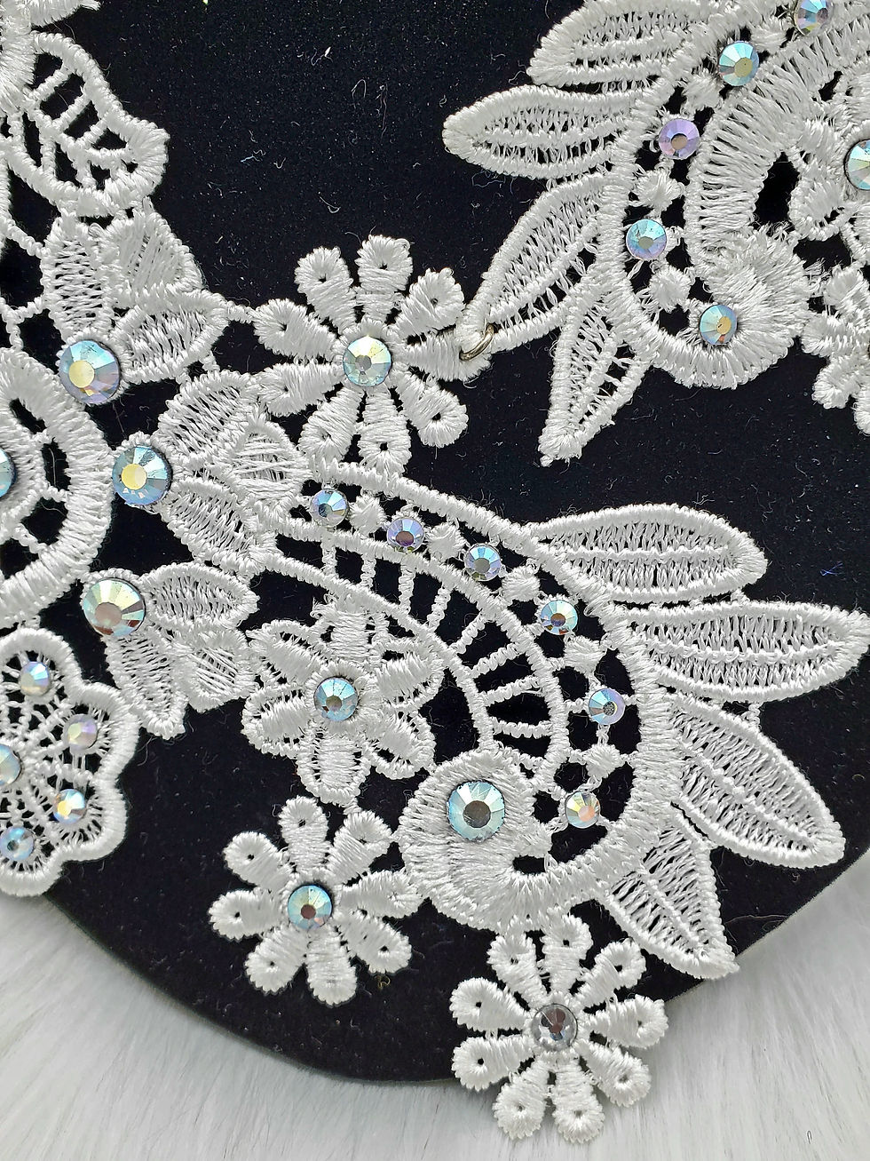 Thumbnail: Asymmetrical white lace necklace