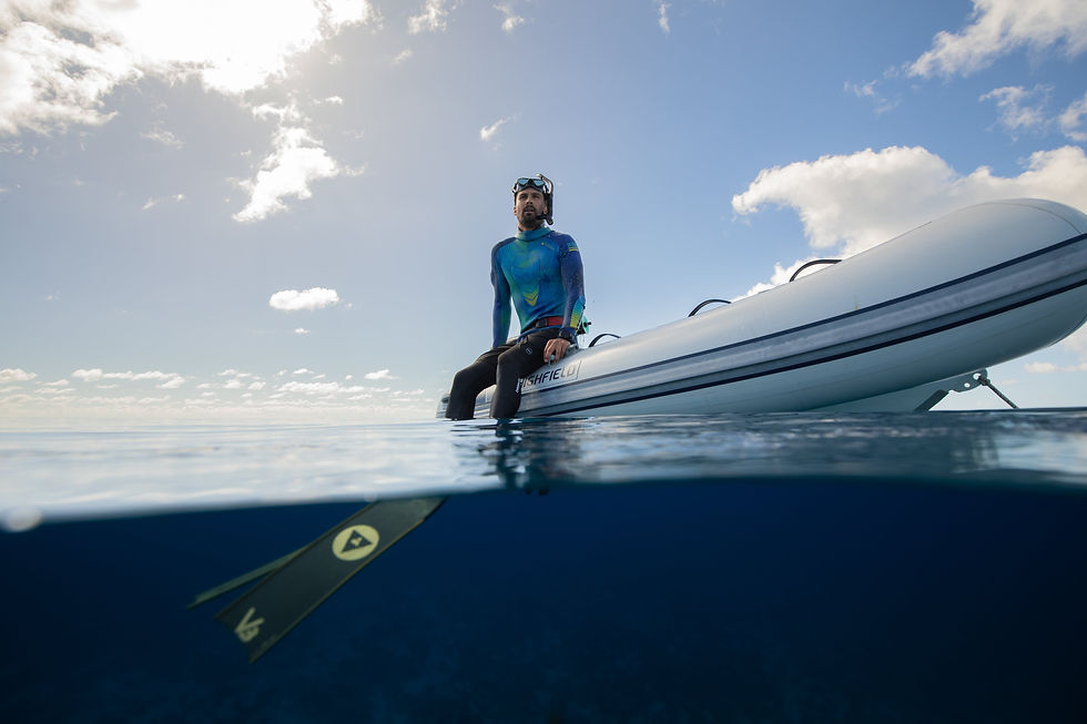 man on dinghy