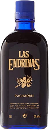 a blue bottle of las endrinas pacharan