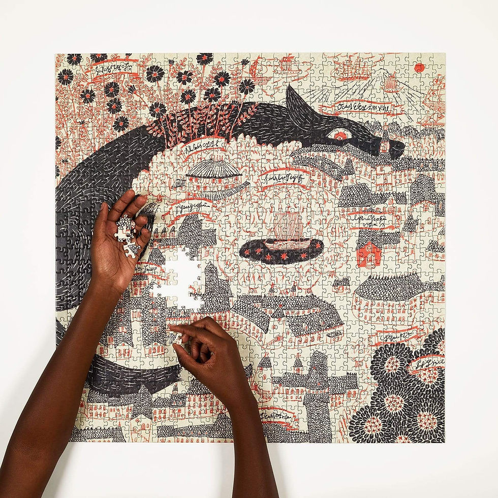 two hands completing a puzzle