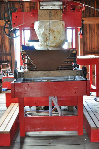 a restored, century-old cider press