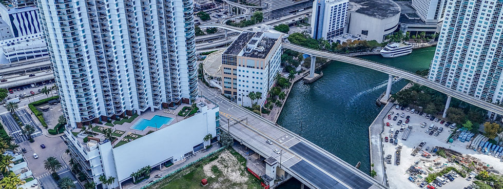 Wind Brickell aerial Miami River bridges waterways Brickell downtown