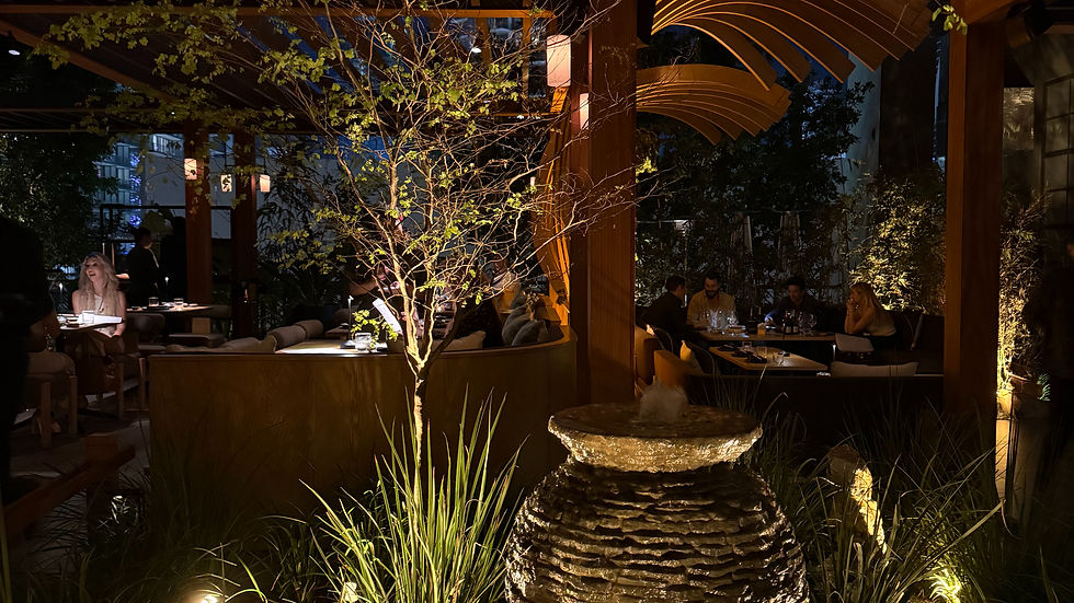 Interior design showing bonsai trees, koi ponds, or fire pit installations