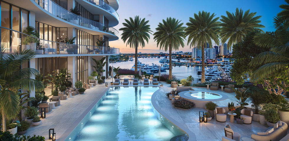 Residences pool deck with marina views at St. Regis Bahia Mar