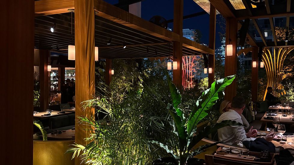 Al fresco dining at Yamashiro Miami with lush tropical landscaping and city views