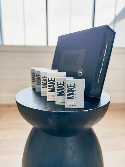 MAKE Wellness product collection displayed with individual supplement packets