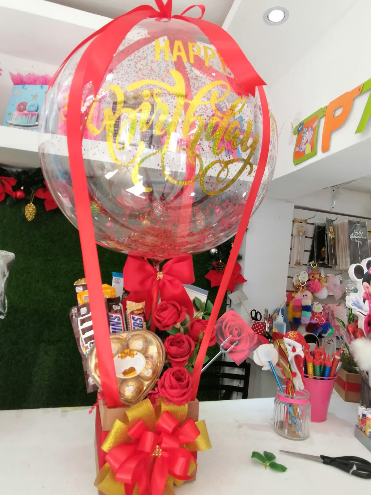 Arreglo con Globos y dulces