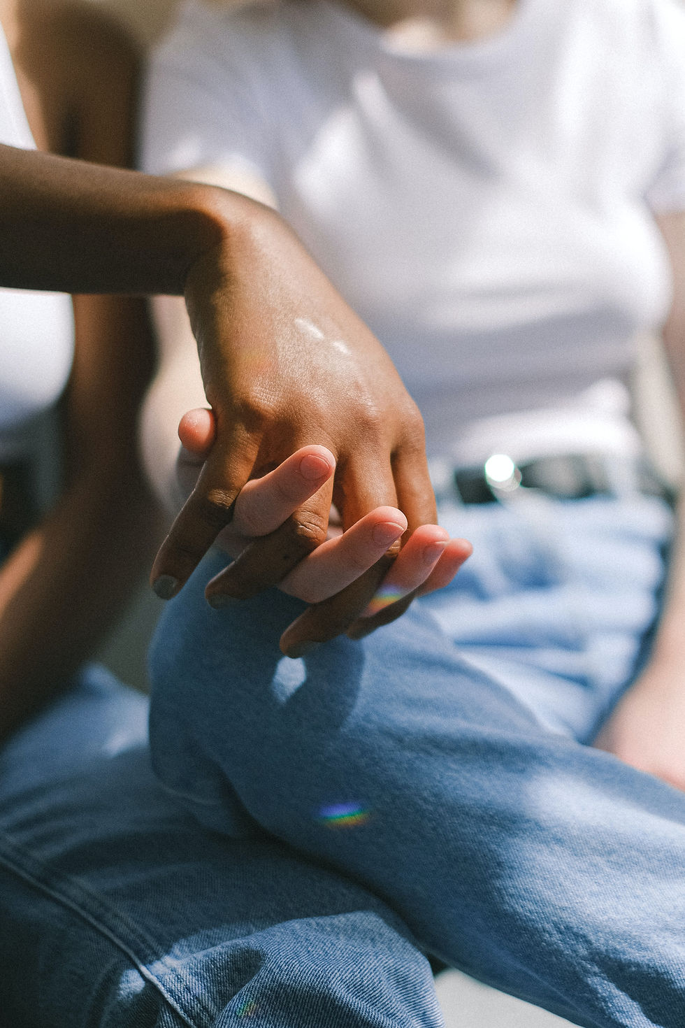 two hands clasped together