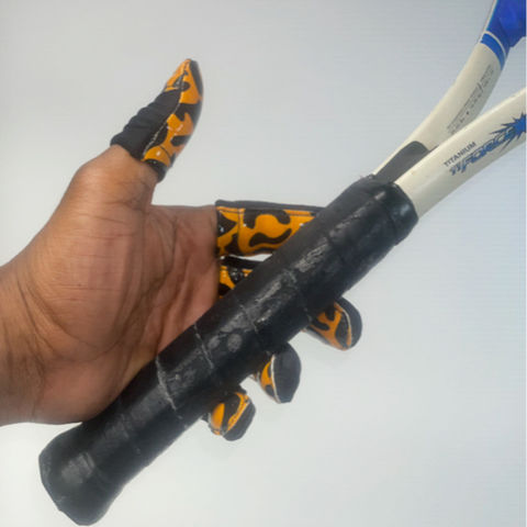 Leopard print Finger Jackets being worn while holding the handle of tennis racket.