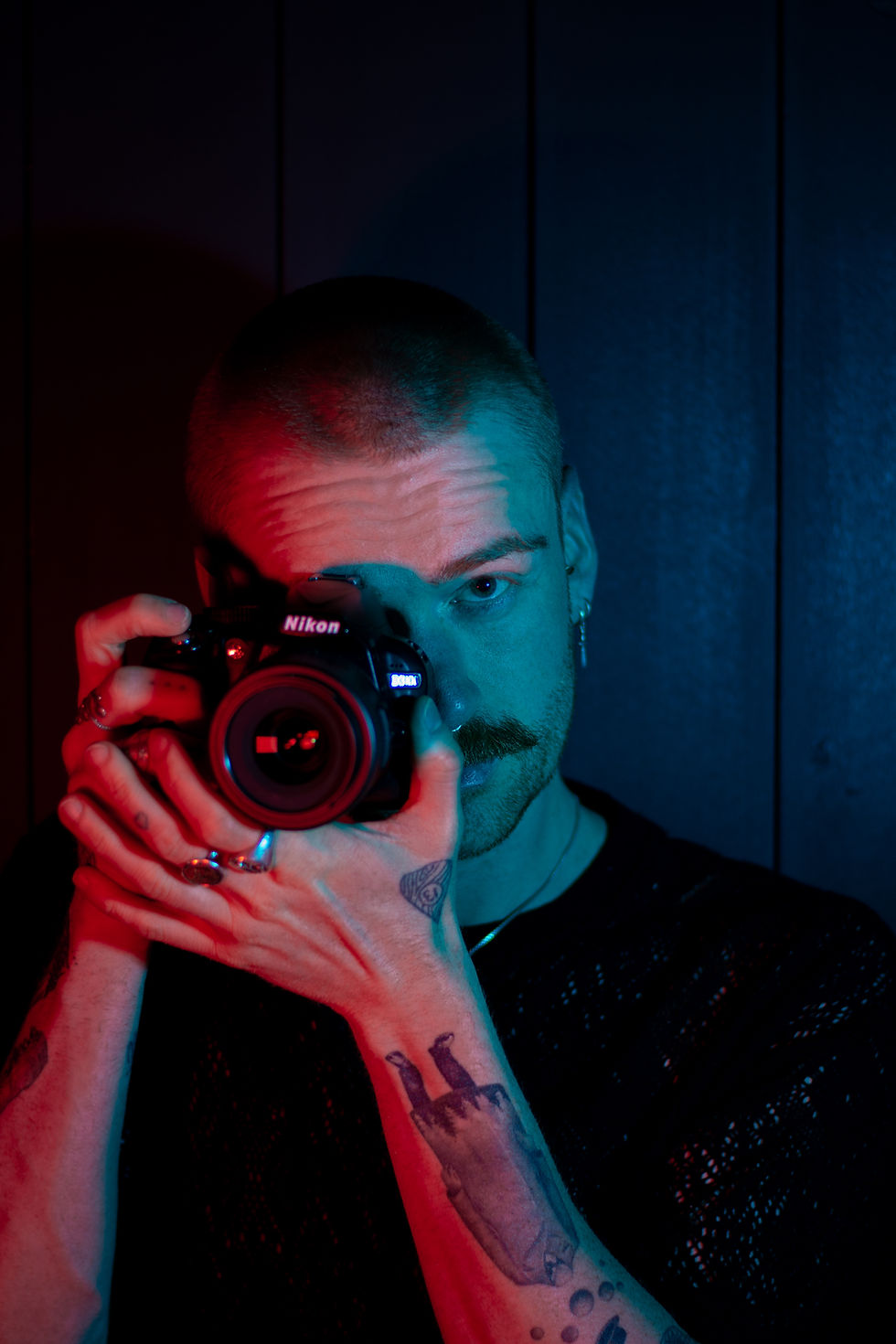 Photographer with Nikon camera for wildlife and landscape photography
