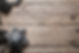 sheriff-star-and-handcuffs-on-wooden-table-2021-08-26-17-02-21-utc.jpg