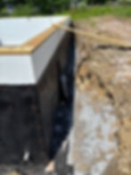 Foundation waterproofing for a Classic Cape Cod house