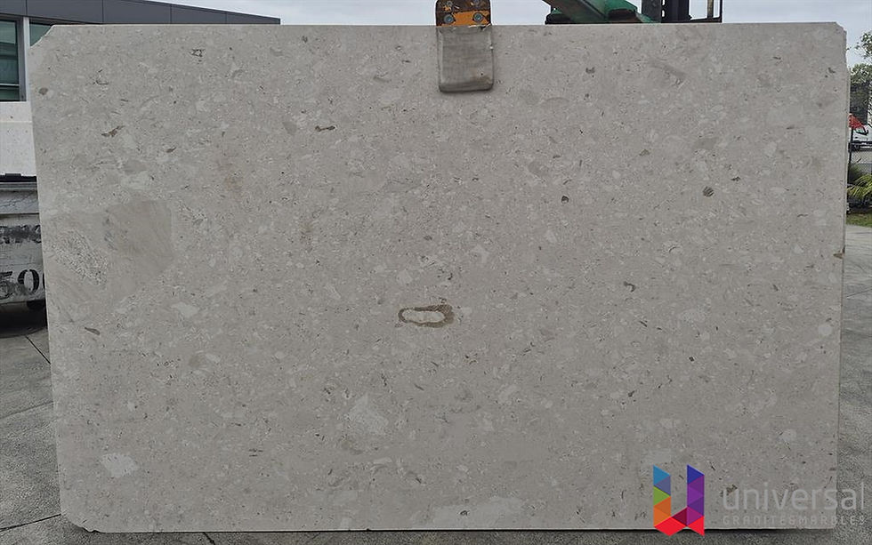 Pelagonia Beige Deluxe soft beige-grey granite slab with fine even mineral texture.