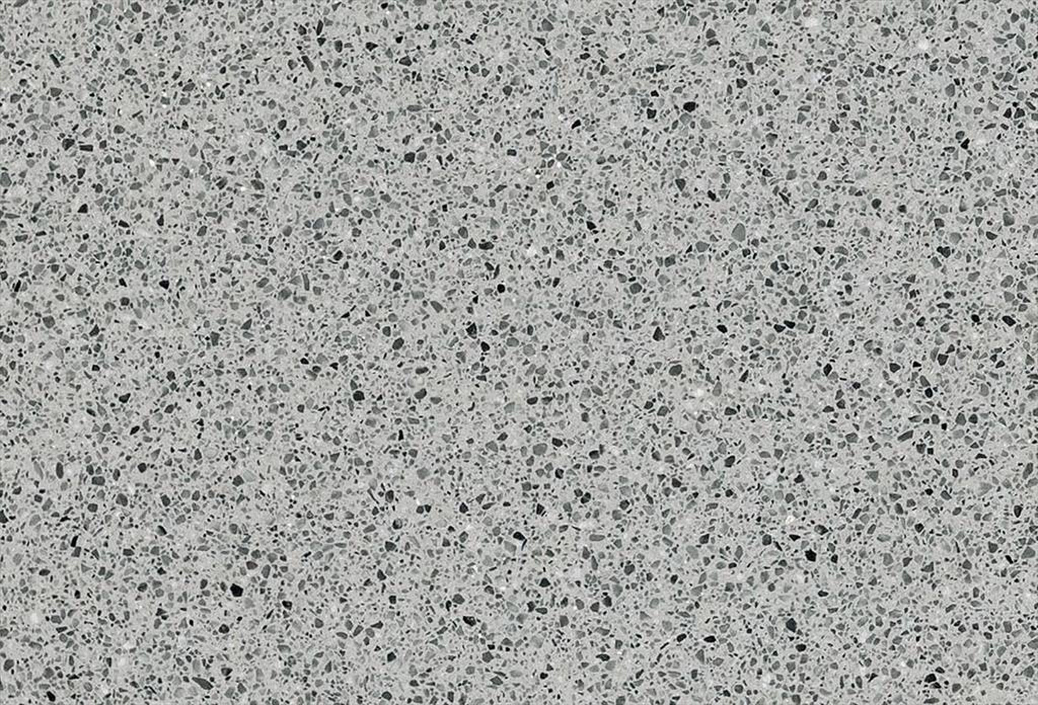 COMPAC Classic Aluminium engineered stone surface with a mid-grey terrazzo-style surface with darker mineral fragments and a refined granular mix
