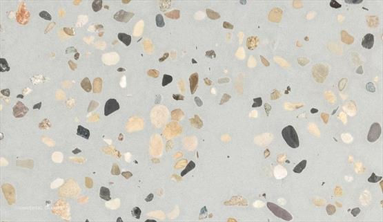 COMPAC Petra Bosco engineered stone surface with a grey terrazzo-style base scattered with varied pale and dark stone fragments
