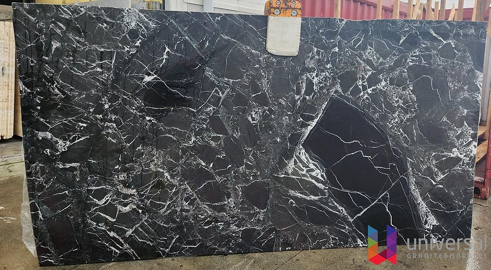 Verde Levanto Deluxe dark green-black marble slab with high-contrast white veining.
