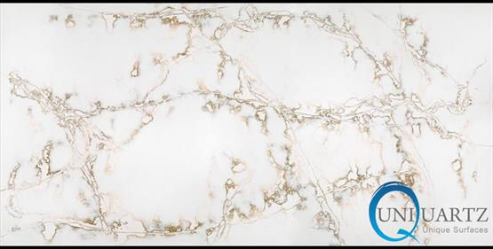 COMPAC Ice Gold engineered stone surface with a bright white base with expressive gold and soft grey marble-style veining