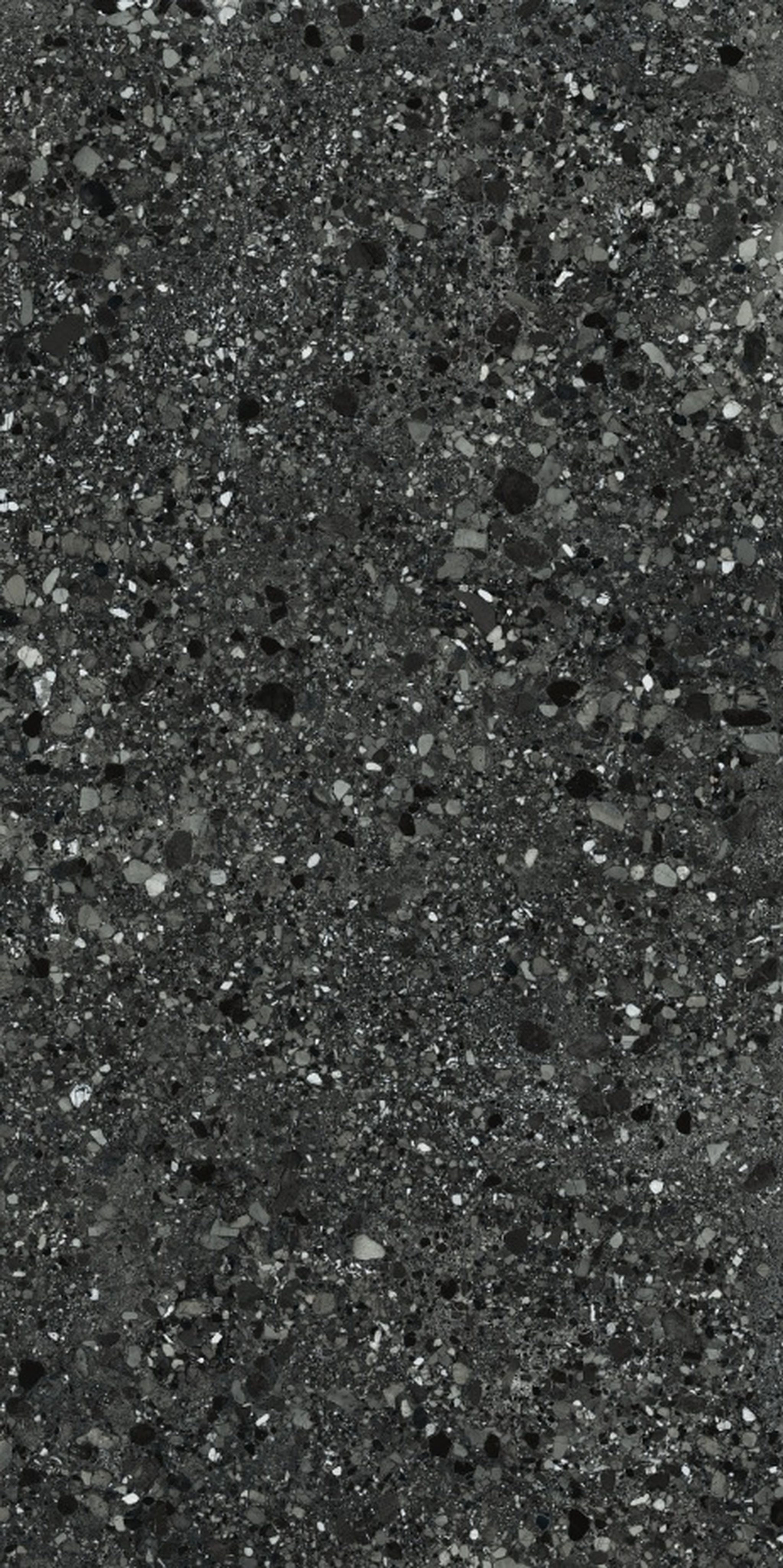 Ascale Monteclemo Black porcelain stone surface with a deep charcoal-black surface with fine mineral speckling