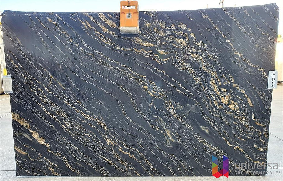Tropical Storm Elite dark quartzite slab with charcoal, black, silver-grey, blue and muted gold layered movement.