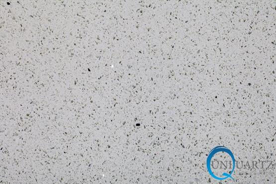 UniQuartz Diamond White engineered stone surface with a clean white base with fine pale-grey and charcoal flecks
