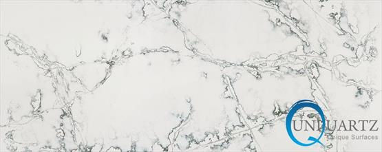 COMPAC Ice Green engineered stone surface with a light white base with soft grey, green-toned and mineral-style veining
