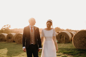 Bride in a relaxed wedding dress with flowing fabric, perfect for a laid-back celebration