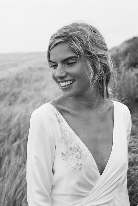 Bohemian Flora gown with three-quarter length sleeves, V back, and nature-inspired Wildflower embroidery on the bodice