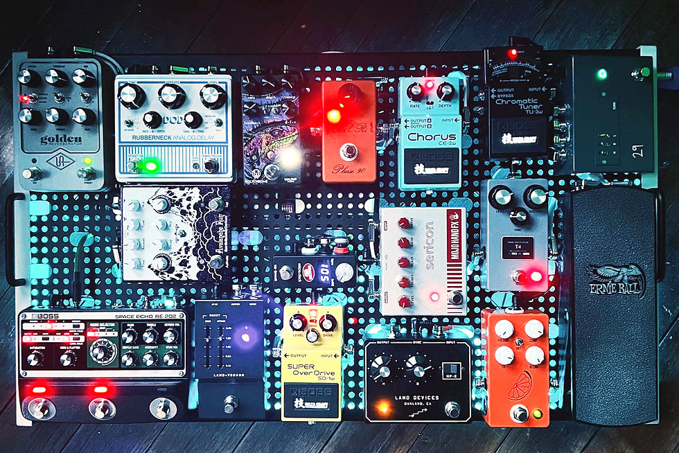 An analogue pedalboard with 16 different guitar pedals