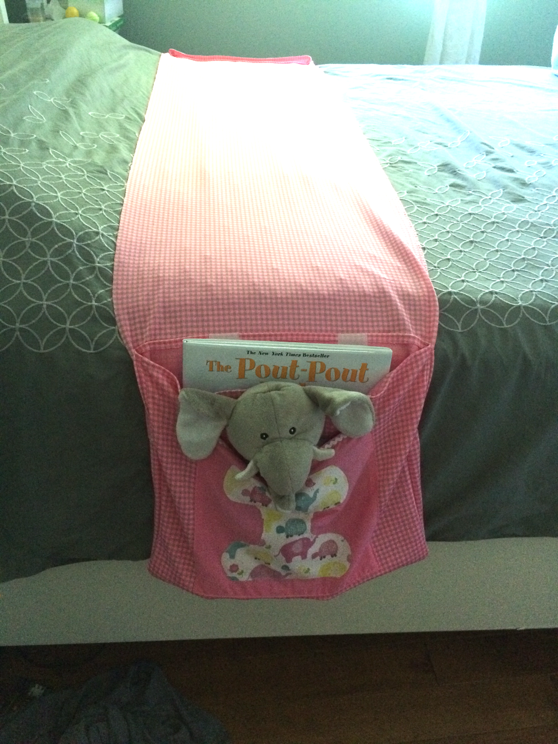 Child's bed book holder