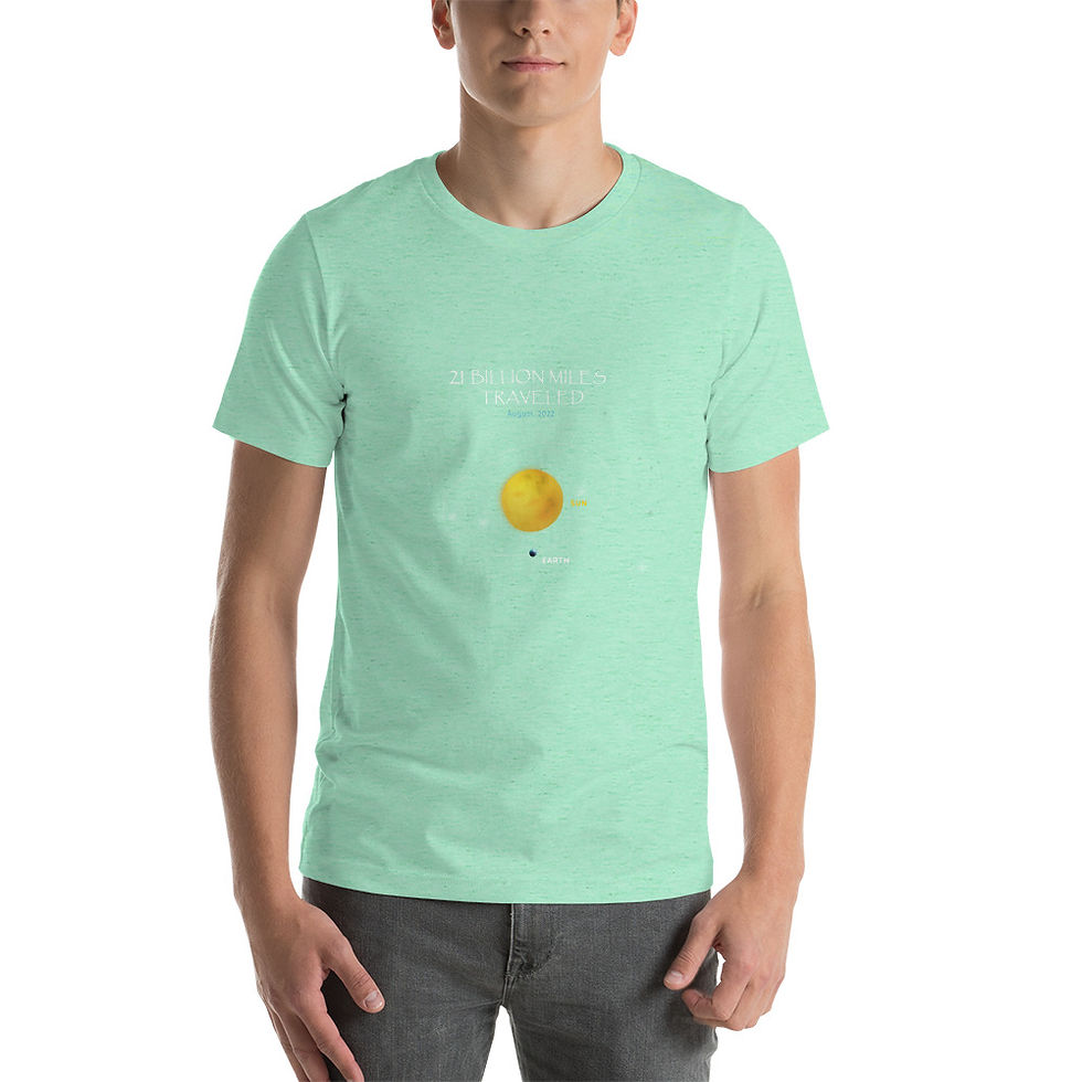 Thumbnail: photo of a young man in a light green colored short sleeved T-shirt with the image of the Earth orbiting the Sun and the words XX Billion Miles Traveled on the chest above the image