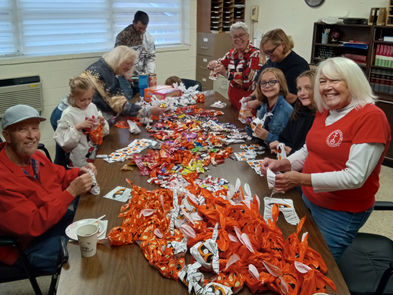 Team Immanuel prepares Trunk R Treat bags.
