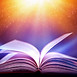 The blurred book that is bewitched with magic, the magic light in the dark, with the brigh