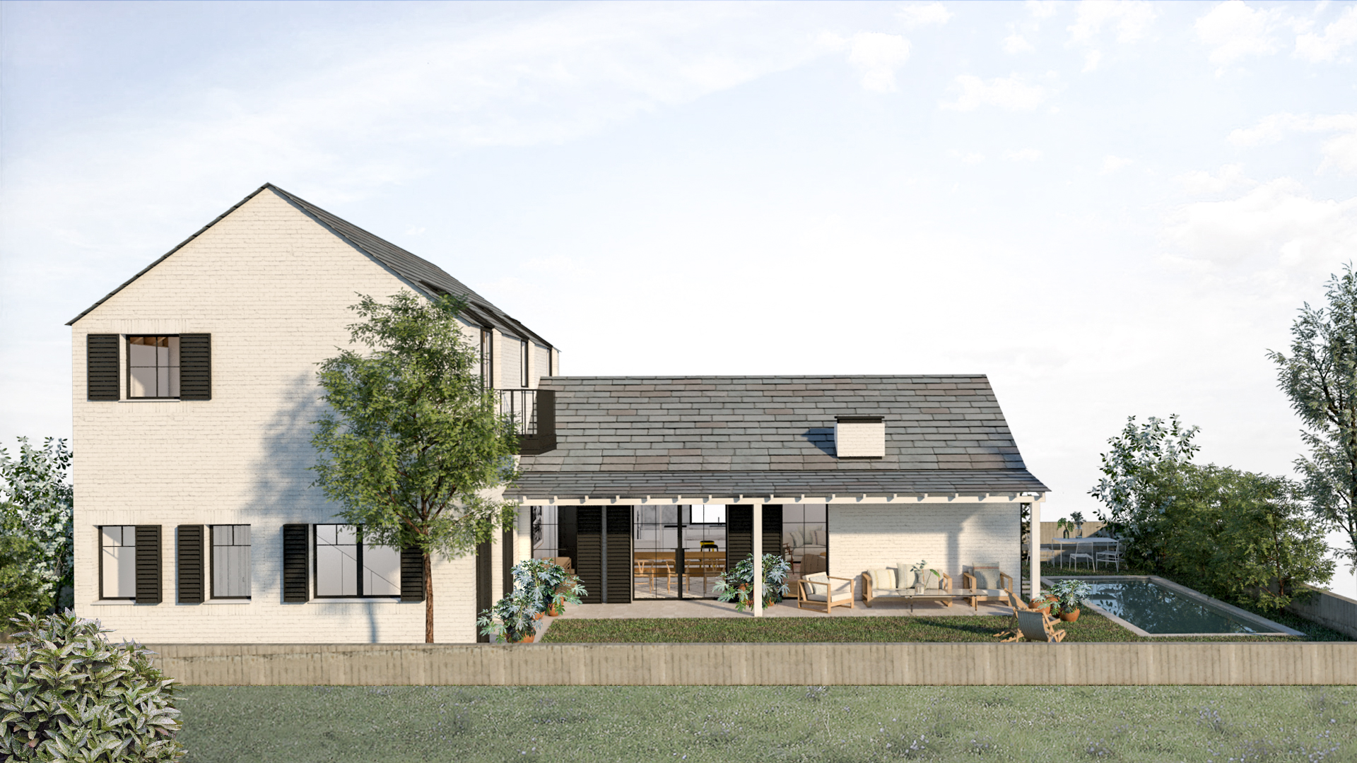 Casa en forma de L, estilo farmhouse, contraventanas de aluminio, cubiertas inclinadas de pizarra, ladrillo blanco