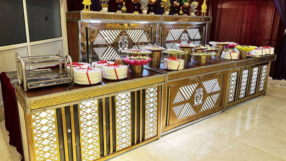 Decorative catering plates arranged on a food table