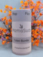 MamaSuds Toilet Bombs cylinder with 'Plop', 'Fizz', and product description against flowers.